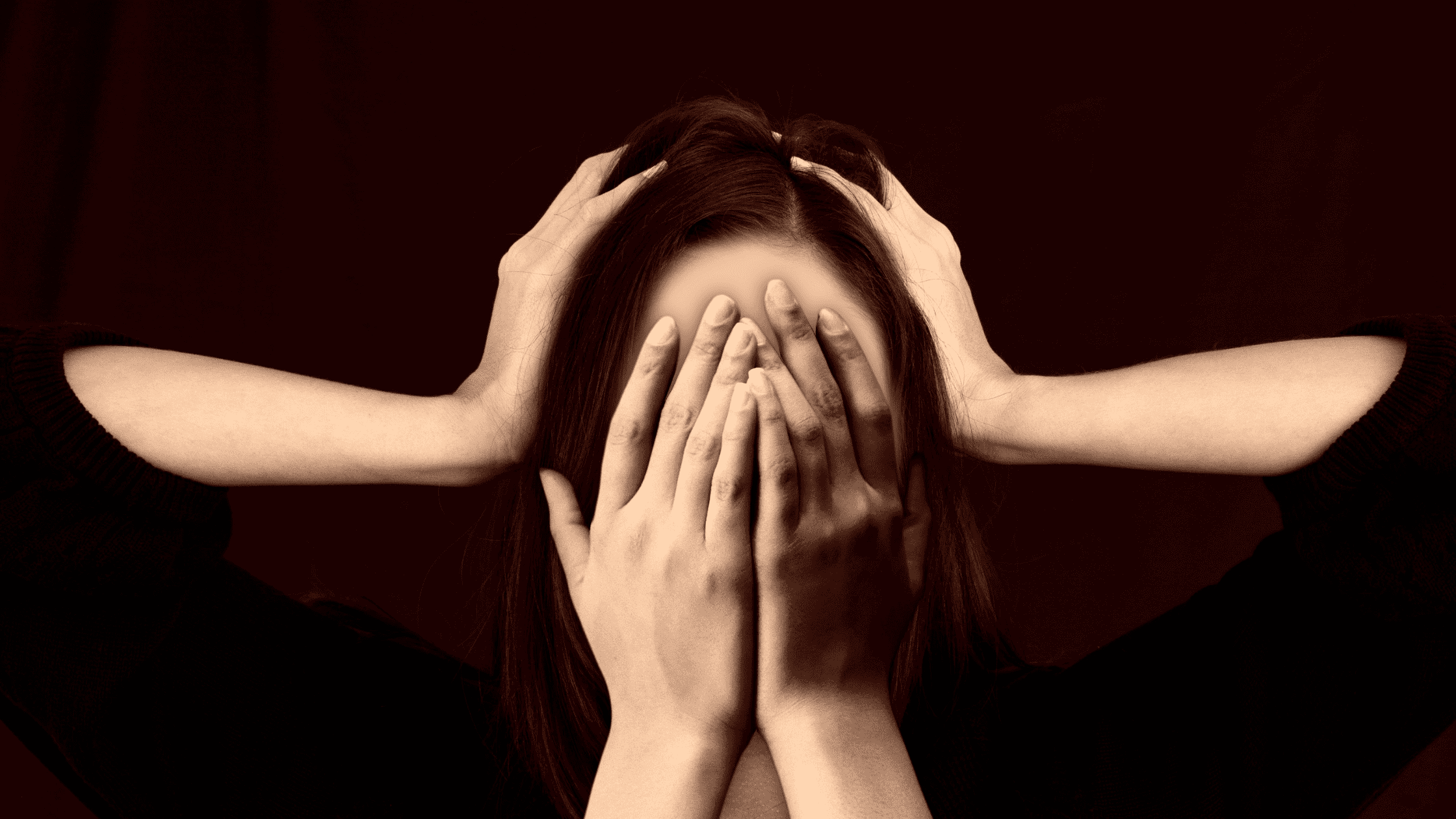 A student with eyes and ears covered dealing with test anxiety.
