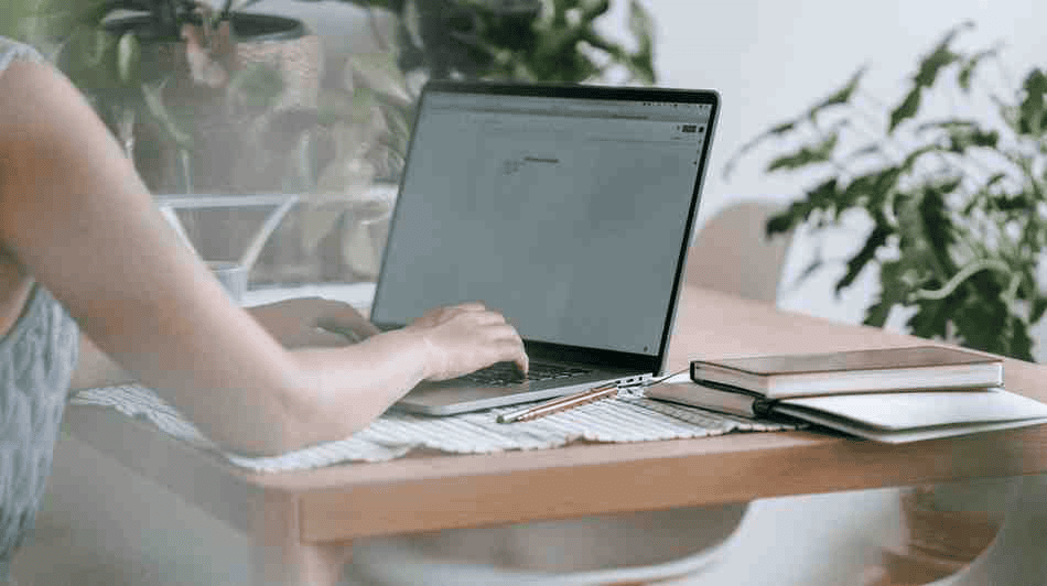 A student using a laptop to prepare her application for SOAP.